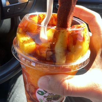 United Paleteria Y Neveria - a person holding a cup of fruit - Ice Cream & Frozen Yogurt Near Me - San Pablo, California United Paleteria Y Neveria - a person holding a cup of fruit - Ice Cream & Frozen Yogurt Near Me - San Pablo, California