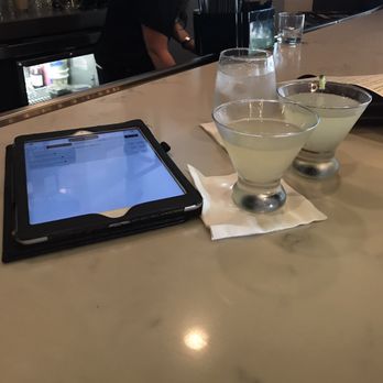 Under the Cork Tree - You know it's fancy when the menu is on an iPad lol. One mango martini and a cucumber refresh martini (made special by bartender) - New American Near Me - Sandy Springs, Georgia Under the Cork Tree - You know it's fancy when the menu is on an iPad lol. One mango martini and a cucumber refresh martini (made special by bartender) - New American Near Me - Sandy Springs, Georgia