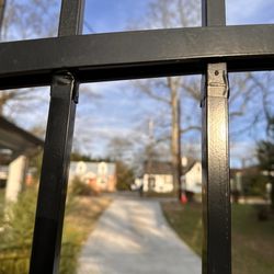 NBDK Fence & Home Services - NBDK owner and so-called professional used electric tape to install and hold metal pickets in place.