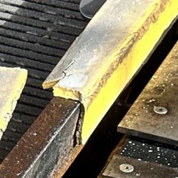 A posed metal upon entering the car wash.