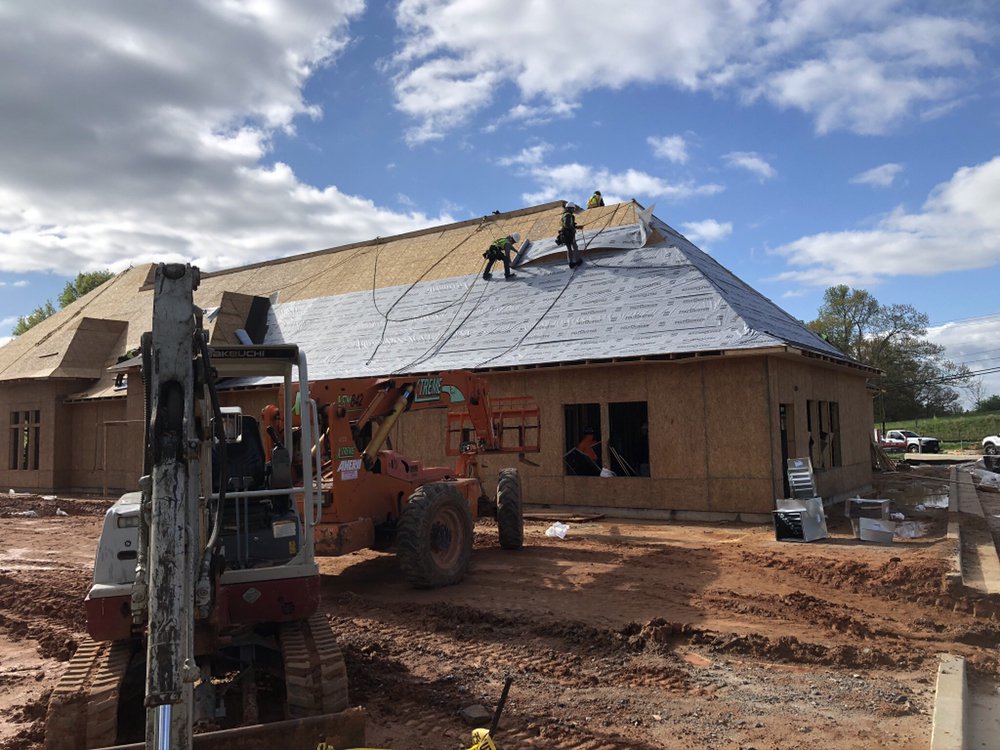 Slide of Academy Roofing