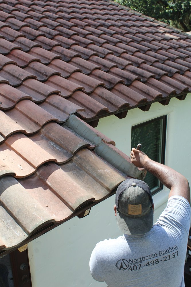 Slide of Northmen Roofing