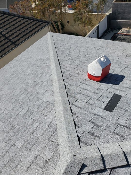 Slide of Martinez Roofing