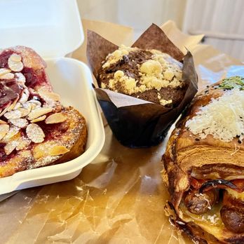 Fortitude Bakehouse - R to L cherry almond bostock, vegan raspberry muffin, lamb merguez savoury roll. - Cafes Near Me - London, XGL Fortitude Bakehouse - R to L cherry almond bostock, vegan raspberry muffin, lamb merguez savoury roll. - Cafes Near Me - London, XGL