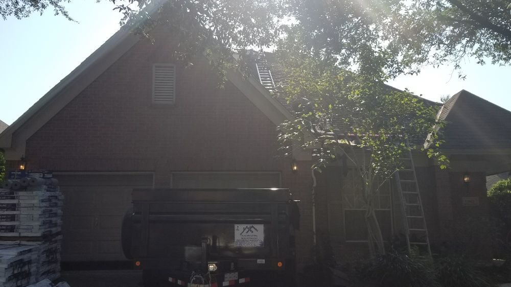 Slide of Axis Roofing