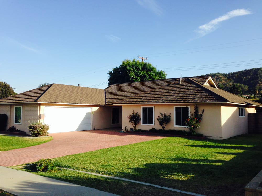 Slide of JW Roofing Services