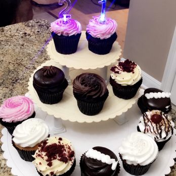 Smallcakes Baton Rouge - cupcakes with lit candles - Cupcakes Near Me - Baton Rouge, Louisiana Smallcakes Baton Rouge - cupcakes with lit candles - Cupcakes Near Me - Baton Rouge, Louisiana