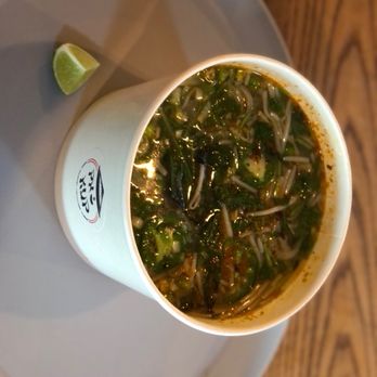 Pho Kup - a bowl of soup on a plate - Vietnamese Near Me - Albuquerque, New Mexico