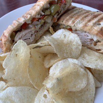 The Grind Coffee and Nosh - Blackened Turkey Muffaletta Sandwich - Breakfast & Brunch Near Me - Biloxi, Mississippi The Grind Coffee and Nosh - Blackened Turkey Muffaletta Sandwich - Breakfast & Brunch Near Me - Biloxi, Mississippi