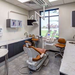 Distinctive Dental Services - Enjoy our comfortable anti-vertigo Adec dental chairs. (Hallway)