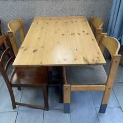 Dine in area with table and chairs for looking to stay