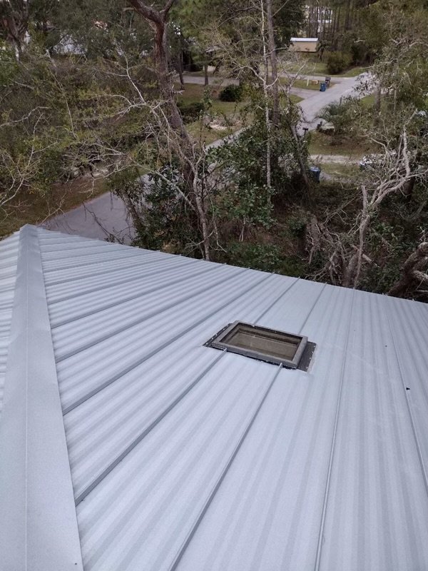 Slide of T-Roys Relief Roofing