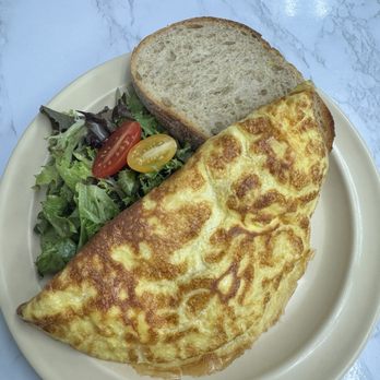 Just Peter's Bistro - Norwegian Omelette - Breakfast & Brunch Near Me - Cocoa Beach, Florida Just Peter's Bistro - Norwegian Omelette - Breakfast & Brunch Near Me - Cocoa Beach, Florida