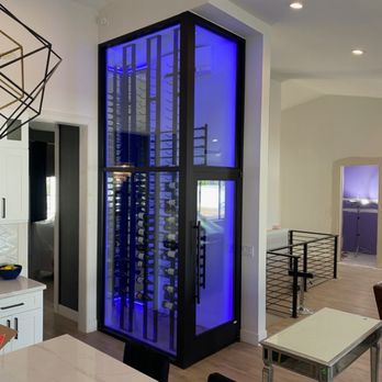 AZ Xtreme Glass & Mirror - Front and Back of a Wine Room Installed in this Chandler, AZ Home w/ Bronze Aluminum Framing and One Inch LowE Tempered Glass. - Windows Installation Near Me - Chandler, Arizona AZ Xtreme Glass & Mirror - Front and Back of a Wine Room Installed in this Chandler, AZ Home w/ Bronze Aluminum Framing and One Inch LowE Tempered Glass. - Windows Installation Near Me - Chandler, Arizona