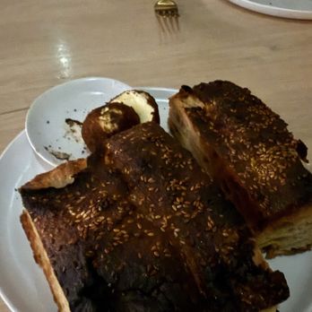Tomat - The bread is a treat - delicious! In house baked. - New American Near Me - Los Angeles, California