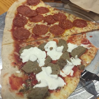 Randy's Pizza - Pepperoni and lasagna pizza... Piece missing on the lasagna pizza because it was so good it begged to be eaten before the pic - Pizza Near Me - Raleigh, North Carolina