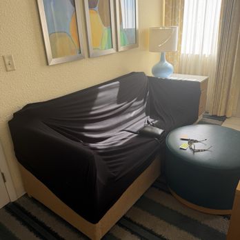 Sonesta ES Suites - The cheap landlord only puts a cheap cover over the crappy couch so disgusting! - Hotels Near Me - Flagstaff, Arizona