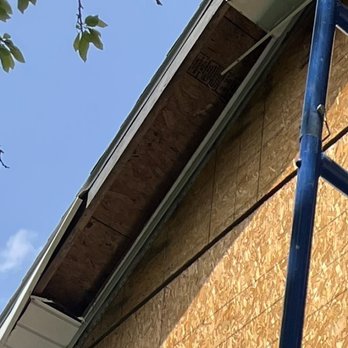 Hallmark Homes - a ladder leaning against the side of a house - General Contractors Near Me - Anderson, Indiana Hallmark Homes - a ladder leaning against the side of a house - General Contractors Near Me - Anderson, Indiana