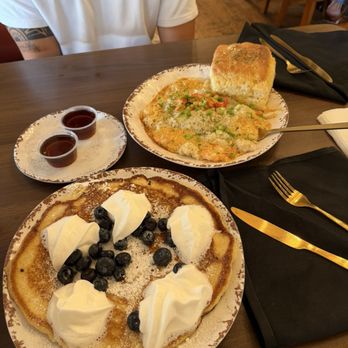 Lazy Oak - single pancake with the fresh fruit and whipped cream & the cajun boiled kiss my grits - Breakfast & Brunch Near Me - Ocean Springs, Mississippi Lazy Oak - single pancake with the fresh fruit and whipped cream & the cajun boiled kiss my grits - Breakfast & Brunch Near Me - Ocean Springs, Mississippi