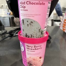 a cup of ice cream on a table a cup of ice cream on a table