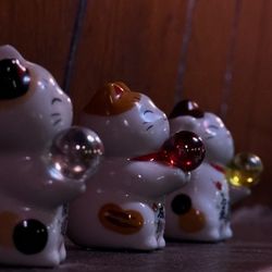 Raku - It's Japanese II - Love these lucky cats on the ledge of the booths
