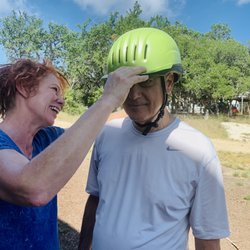Miercoles Moon - My boyfriend having his helmet properly fitted during our lesson at Miercoles Moon.