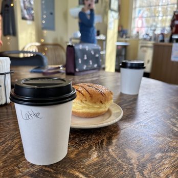 Cafe Lotti - a cup of coffee and a donut on a plate - Cafes Near Me - East Burke, Vermont Cafe Lotti - a cup of coffee and a donut on a plate - Cafes Near Me - East Burke, Vermont