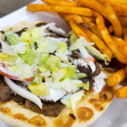 Max Mart - Gyro sandwich with our amazing fries that carry have a nice kick.