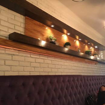Prince Tea House - Decor behind bench seating - Desserts Near Me - Brooklyn, New York Prince Tea House - Decor behind bench seating - Desserts Near Me - Brooklyn, New York
