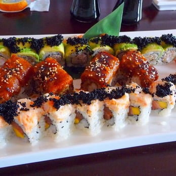 Saketumi - These are all specialty rolls.. the top one is crab, the middle is calamari and the bottom is i believe tuna and mango! - Japanese Near Me - Rehoboth, Delaware Saketumi - These are all specialty rolls.. the top one is crab, the middle is calamari and the bottom is i believe tuna and mango! - Japanese Near Me - Rehoboth, Delaware