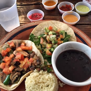 La Santisima - Ghandi and the vegan tacos!! Love the salsa bar too!! Pickled onions were so yummy - Mexican Near Me - Phoenix, Arizona