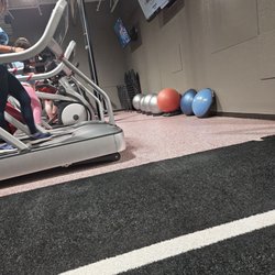 Perfected bodies fitness - The treadmills in the turf room. My daughter walking.
