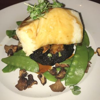 Seasons 52 - Sea bass with black rice - New American Near Me - Houston, Texas