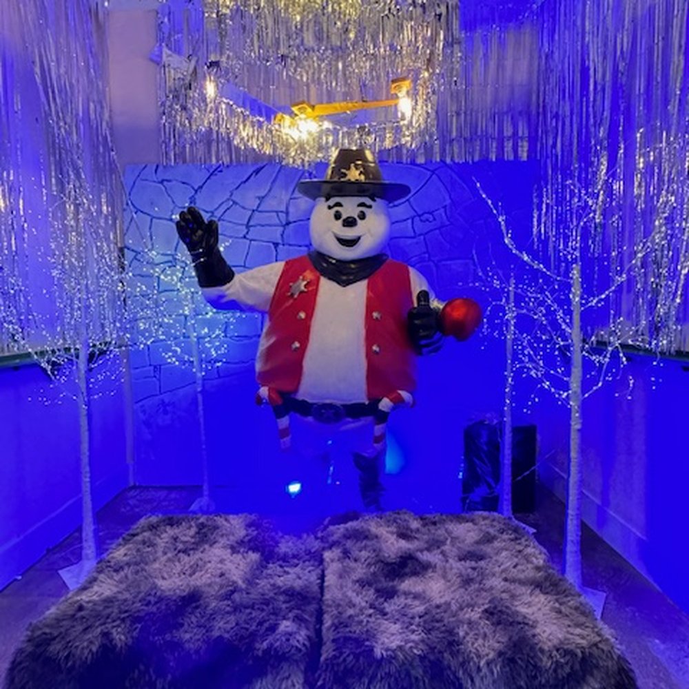 Winnie's - Large Cowboy Snowman ready for photo ops! - Cocktail Bars Near Me - Houston, Texas Winnie's - Large Cowboy Snowman ready for photo ops! - Cocktail Bars Near Me - Houston, Texas