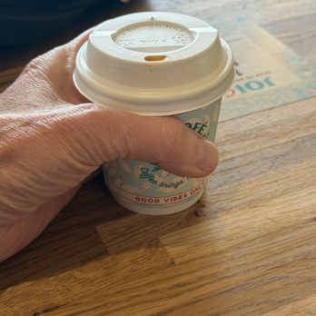 JOi Cafe - The tiny and grossly overpriced cap. I do not have giant hands. 9oz?!?! Really??? Absurd. Never again. - Vegan Near Me - Westlake Village, California JOi Cafe - The tiny and grossly overpriced cap. I do not have giant hands. 9oz?!?! Really??? Absurd. Never again. - Vegan Near Me - Westlake Village, California