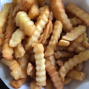 China Express - a close up of a container of french fries - Chinese Near Me - Miami, Florida China Express - a close up of a container of french fries - Chinese Near Me - Miami, Florida