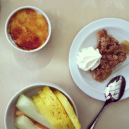 Brunch desserts include creme brulee, apple crumble and fruits Brunch desserts include creme brulee, apple crumble and fruits
