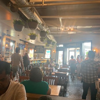 En Su Boca - people sitting at tables in a restaurant - Mexican Near Me - Richmond, Virginia En Su Boca - people sitting at tables in a restaurant - Mexican Near Me - Richmond, Virginia