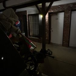 Exterior: view of rear of my loaded (motor)vehicle parked in front of my room upon my late arrival