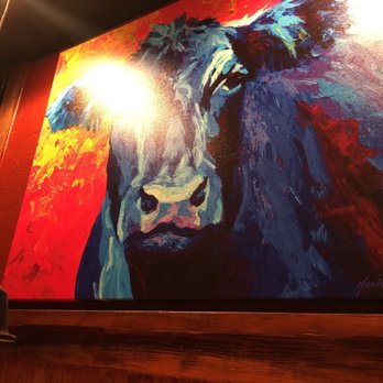Briquettes Steakhouse - Artistic pictures of beef everywhere, lol. - Steakhouses Near Me - Mobile, Alabama