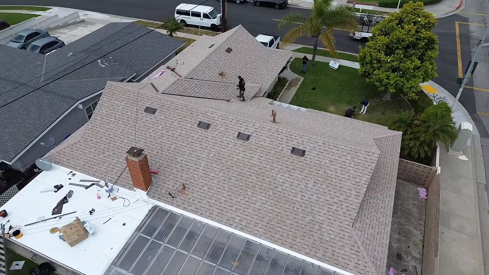 Slide of Sandoval Roofing