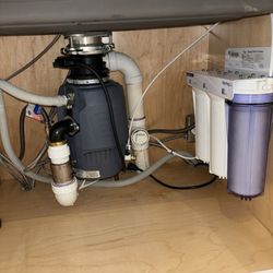 Dov Sewer and Drain - New installation of garbage - food disposal, and water filter underneath kitchen sink.
