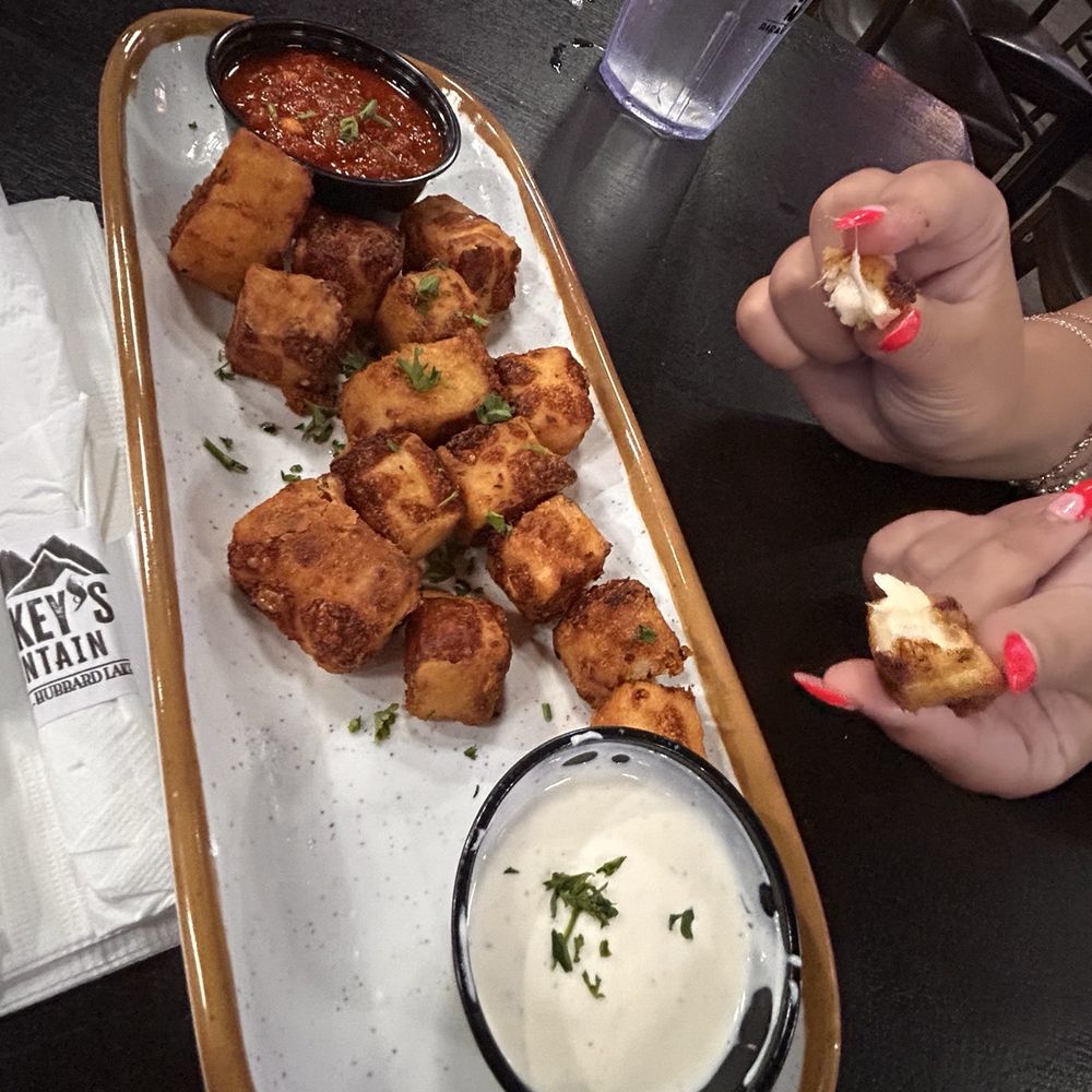 Smokey’s Mountain Bar & Grill - Garlic Mozzarella Cubes - Beer Bar Near Me - Spruce, Michigan Smokey’s Mountain Bar & Grill - Garlic Mozzarella Cubes - Beer Bar Near Me - Spruce, Michigan