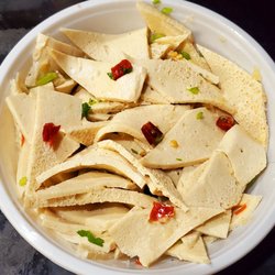Spice Workshop - Sliced Tofu cold appetizer. Tender tofu, with scallion, chilis, and cilantro. Tasty mild flavor.