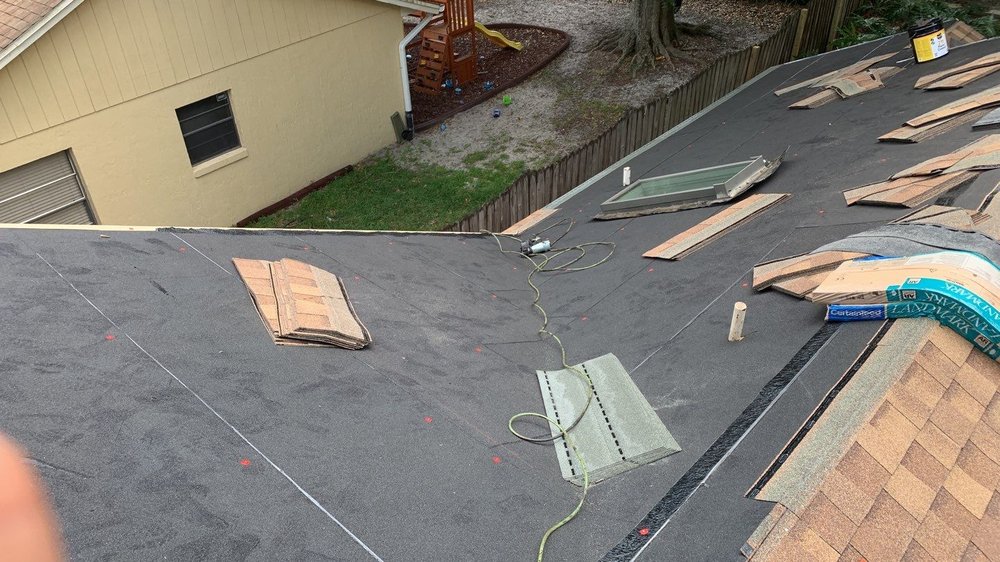 Slide of RC Roofing Florida