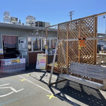 Farmhouse Thai Express - San Leandro - Porch swing for guests that are waiting for their food. - Thai Near Me - San Leandro, California