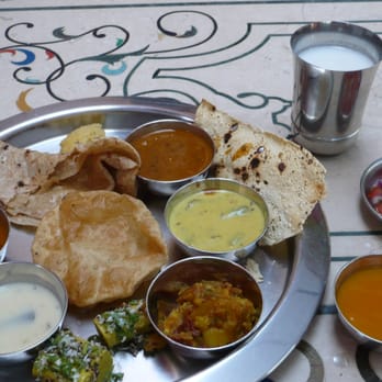 Rajdhani - This, and it just keeps on coming, endless puffy puri's and dry or buttered roti's (your choice) - Indian Near Me - Artesia, California Rajdhani - This, and it just keeps on coming, endless puffy puri's and dry or buttered roti's (your choice) - Indian Near Me - Artesia, California