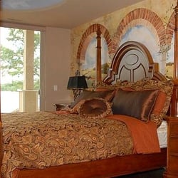 Delton Grand Resort & Spa - Exotic - one-of-a-kind Theme Suites with private patio and in-room personal whirlpool, wet bar and body massage shower