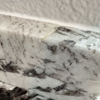 Custom Stone Interiors - Broken backsplash, repaired with epoxy and installed. Did not tell us. - General Contractors Near Me - Bakersfield, California