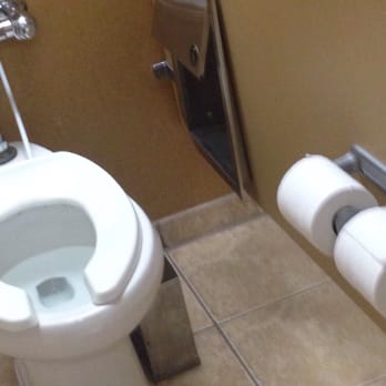 Hilton Memphis - Trash cans not installed correctly. This one is not even connected to the wall, just balanced there in a somewhat square hole. - Hotels Near Me - Memphis, Tennessee